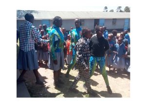 Children of Kenya, Africa dressed in Sassy Jones Ready to Wear collections.