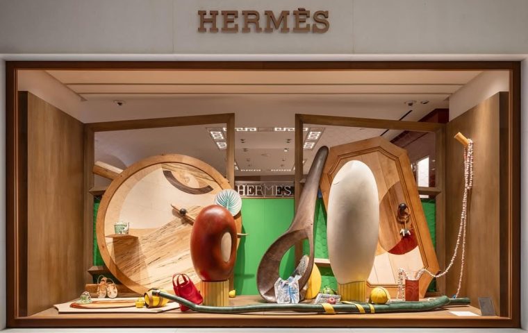 Hermès Turns its Venice Windows Into an “Inside The Cabinet” Still Life of Vessels, Furniture and Food