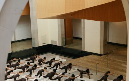 Attendees taking part in a 437 Pilates class at the Art Gallery of Ontario