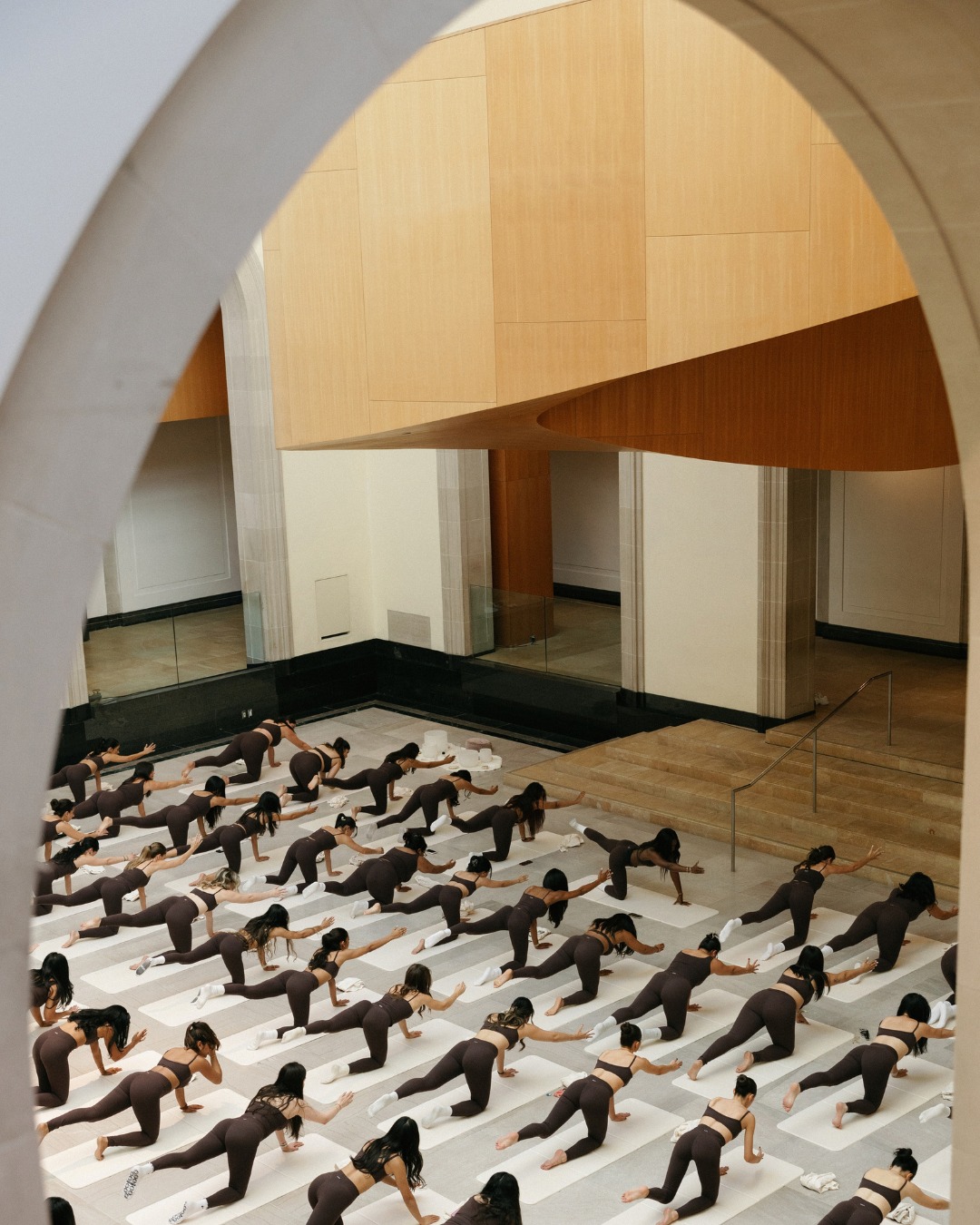 Attendees taking part in a 437 Pilates class at the Art Gallery of Ontario