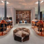 Interior of the reopened 7 For All Mankind SoHo flagship, view 1