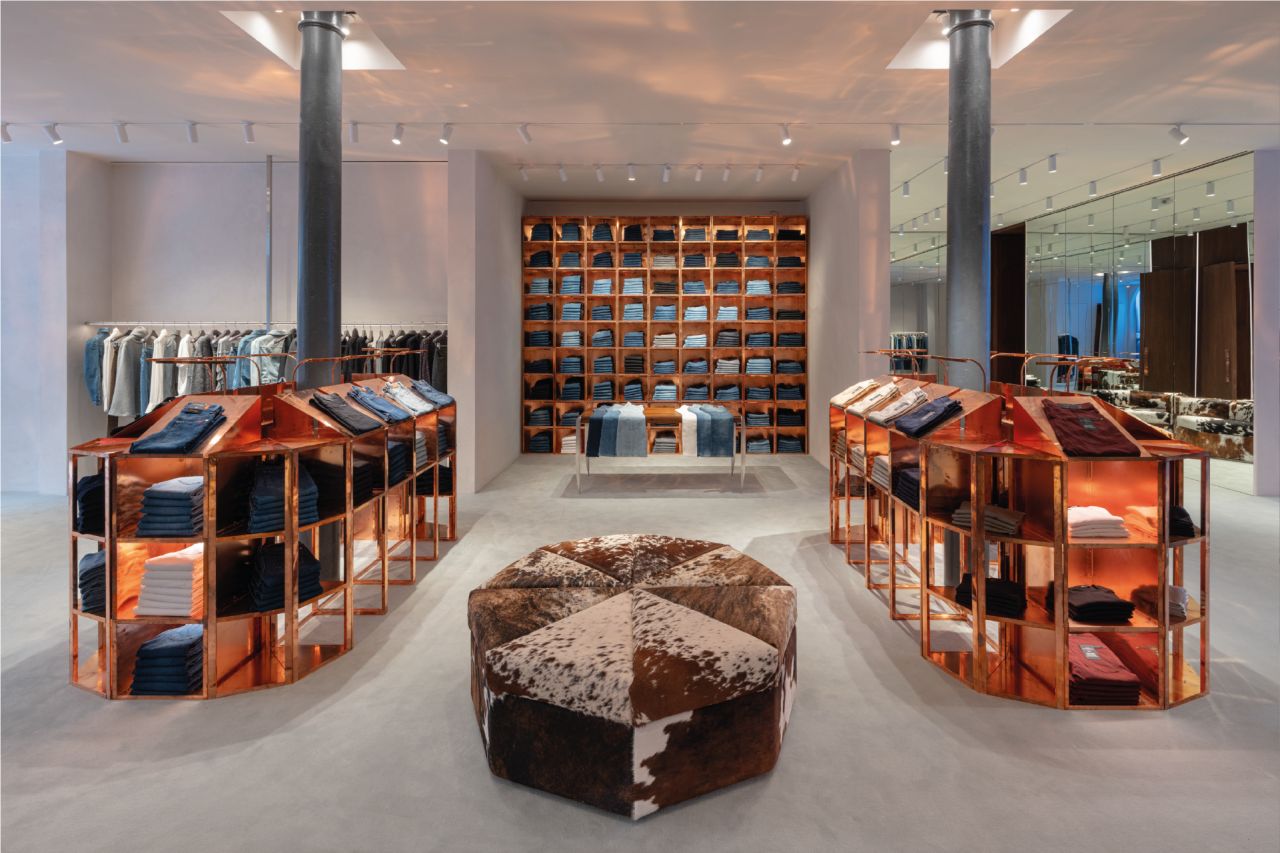 Interior of the reopened 7 For All Mankind SoHo flagship, view 1