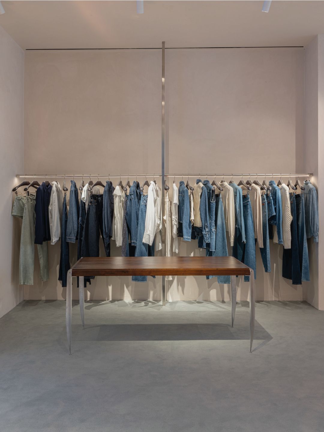Interior of the reopened 7 For All Mankind SoHo flagship, view 2