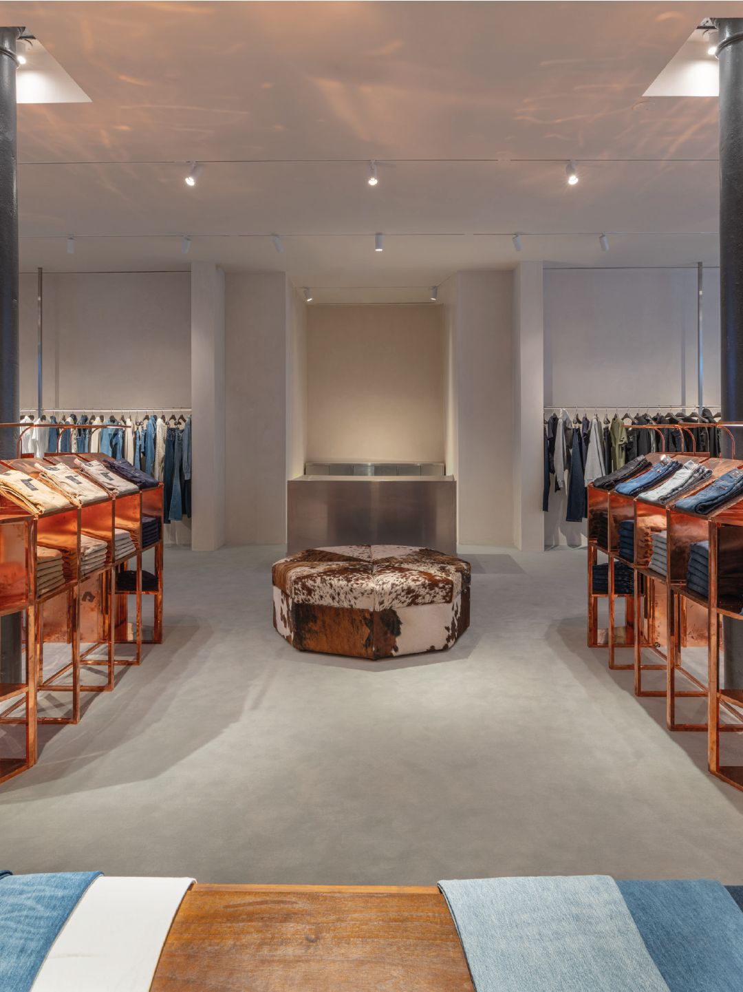 Interior of the reopened 7 For All Mankind SoHo flagship, view 5