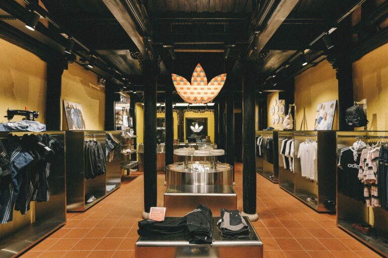 Interior of the adidas Originals Heritage Store in Hoi An with timber beams and product displays
