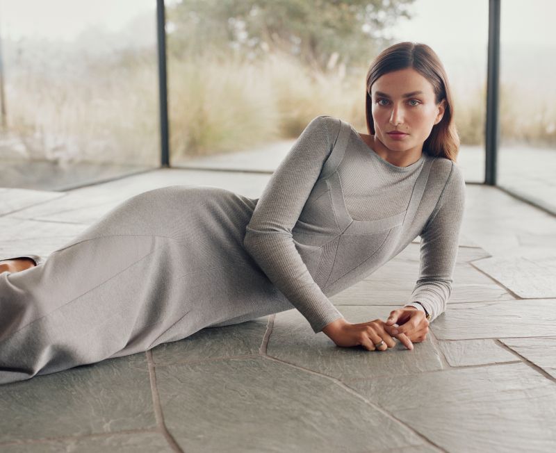 Anthropologie Fall Is a Feeling campaign: layered gray knitwear and a long gray dress
