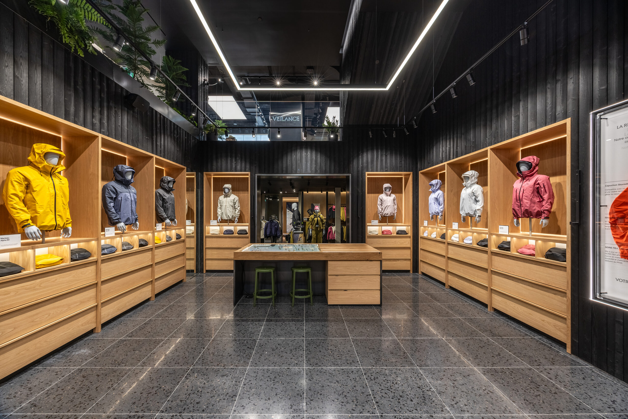 Outerwear displays inside Arc’teryx’s Montréal Alpha Store.
