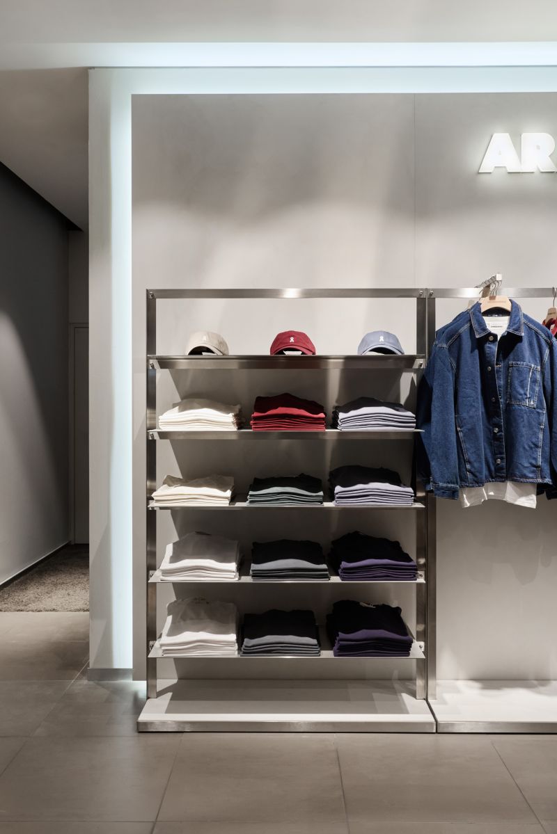 ARMEDANGELS menswear shop-in-shop at Kastner and Öhler — image 1