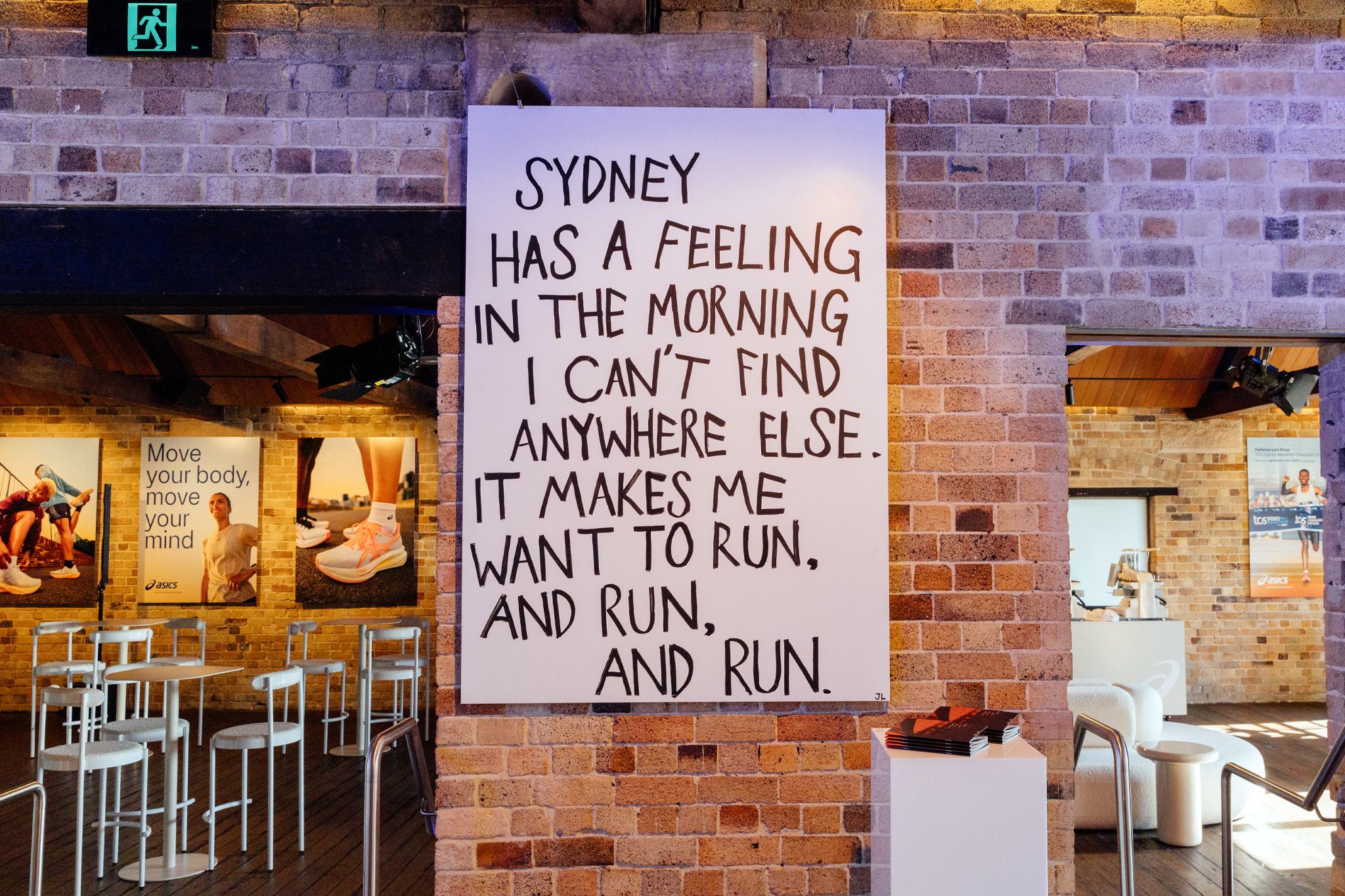 Running-themed writing displayed at the Sydney activation