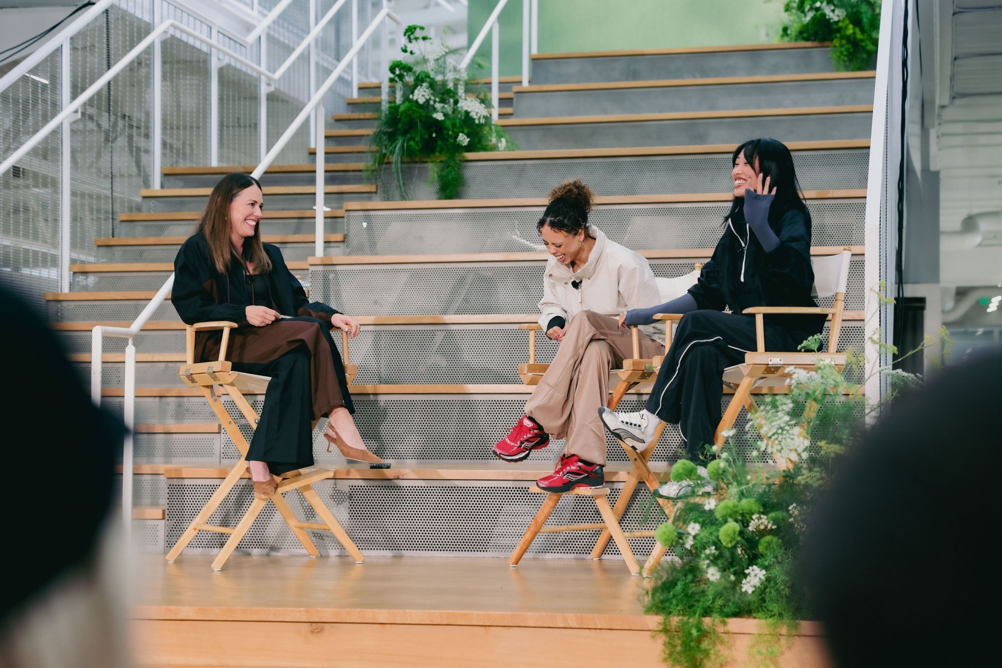 Athleta staff attend the Quest event