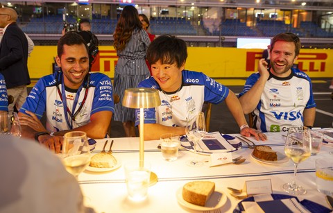 Yuki Tsunoda at La Tavolata alongside members of the Visa Cash App Racing Bulls team.