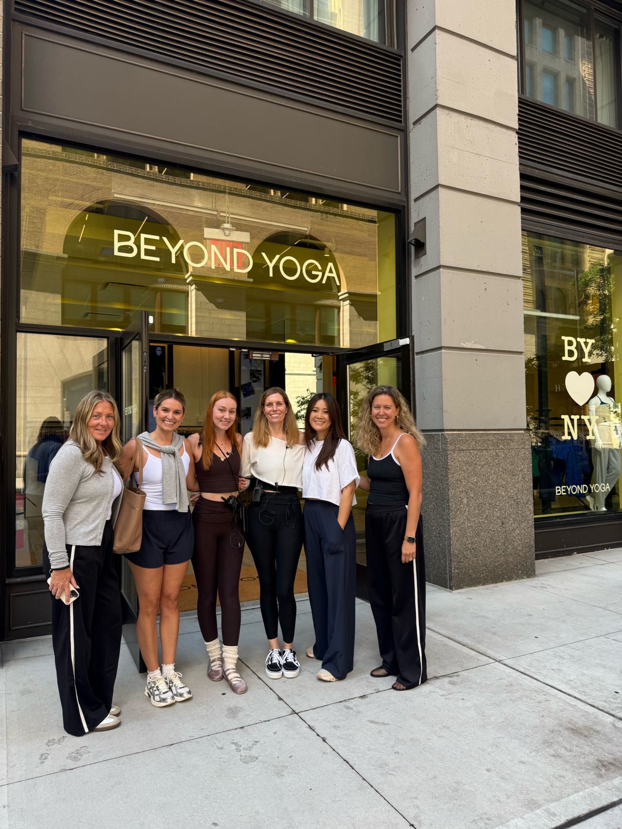 Beyond Yoga team outside the New York store