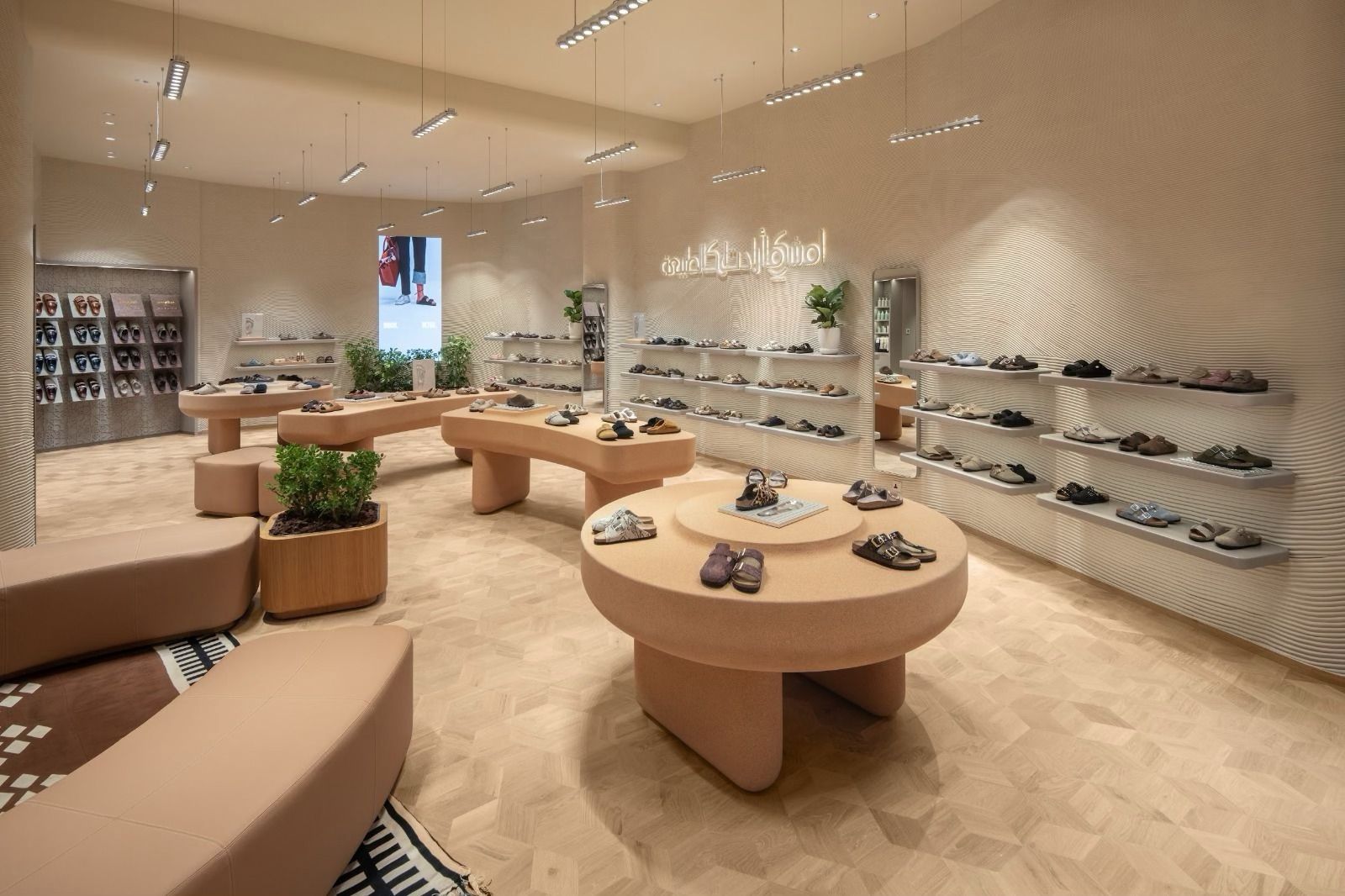 Interior of the Birkenstock Mall of the Emirates store with sand-toned displays