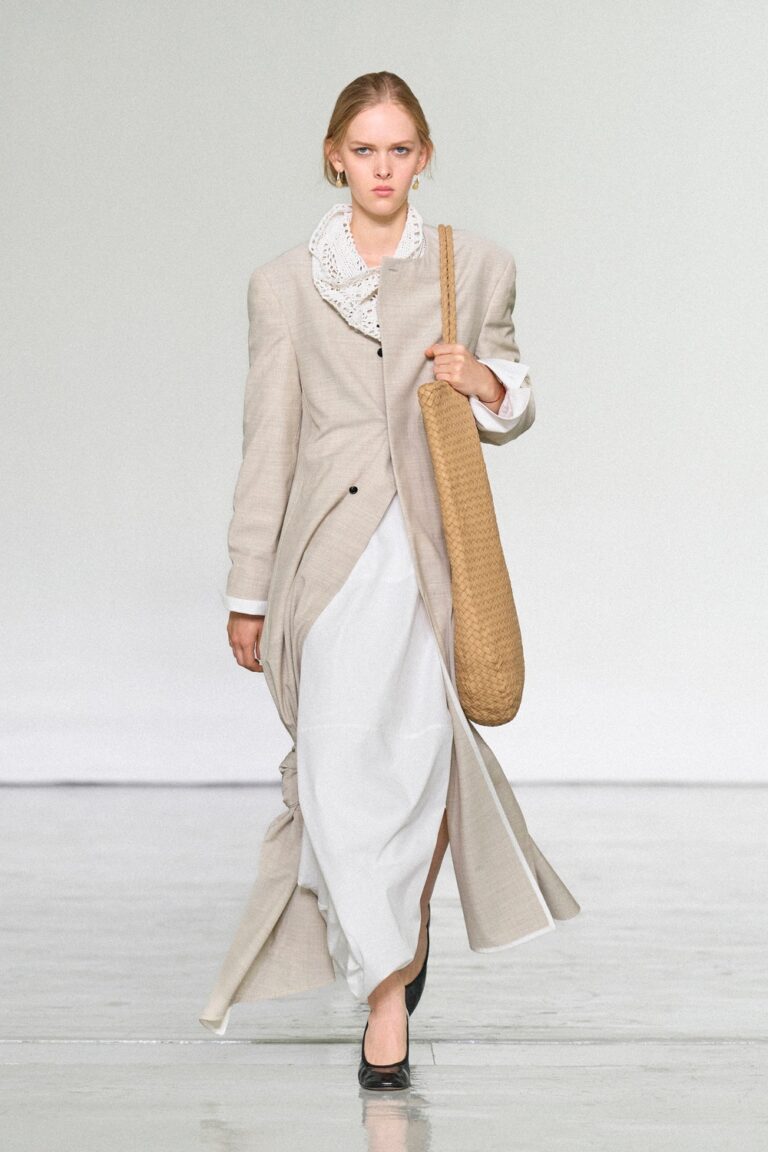 Bottega Veneta Summer 2027 runway look with light tailoring and woven bag