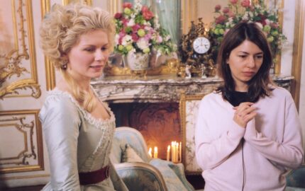 Kirsten Dunst in costume with Sofia Coppola on the set of Marie Antoinette at Versailles