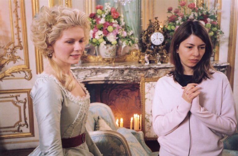 Kirsten Dunst in costume with Sofia Coppola on the set of Marie Antoinette at Versailles