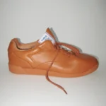 CELINE and Reebok Freestyle Lo in Peanut, shown in side profile
