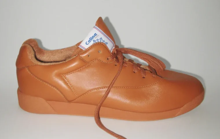 CELINE and Reebok Freestyle Lo in Peanut, shown in side profile