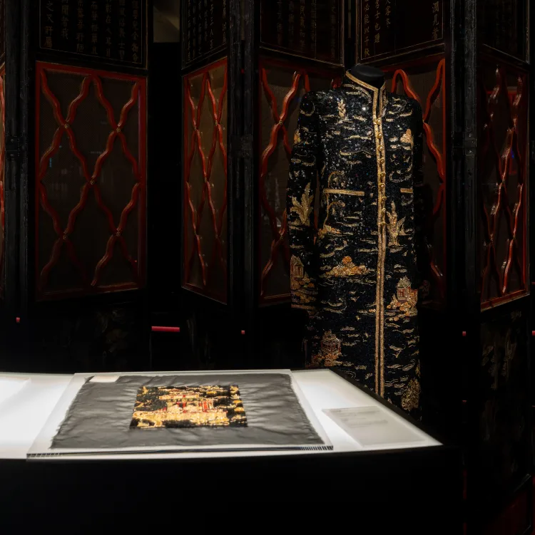 Embroidered Lesage coat and textile work displayed in Shanghai