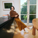 Jenny Slate wearing Cole Haan sneakers in the fall 2026 campaign.