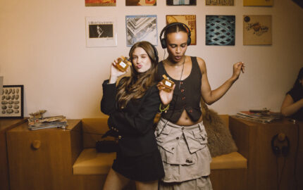 Guests holding Chloé Le Nectar bottles at the music-led fragrance activation
