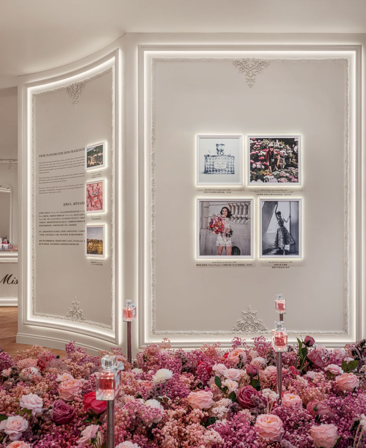 Flower-filled heritage display inside a Miss Dior pop-up