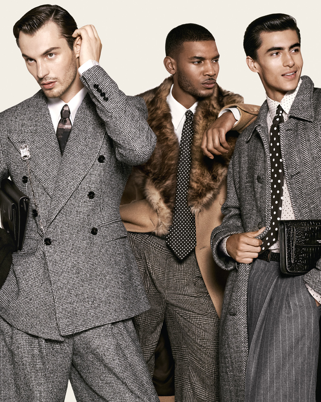 Three models in patterned tailoring and outerwear