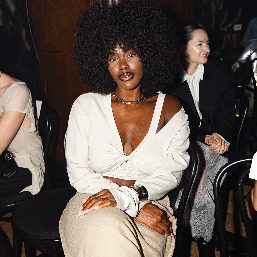 Guest seated at the Elena Velez YR009 show