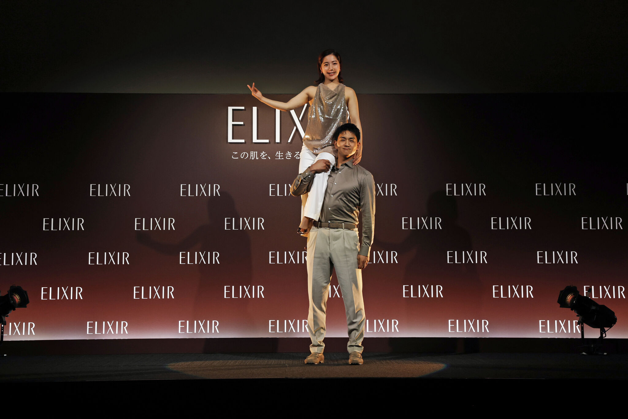 Figure skaters performing a lift at the ELIXIR event