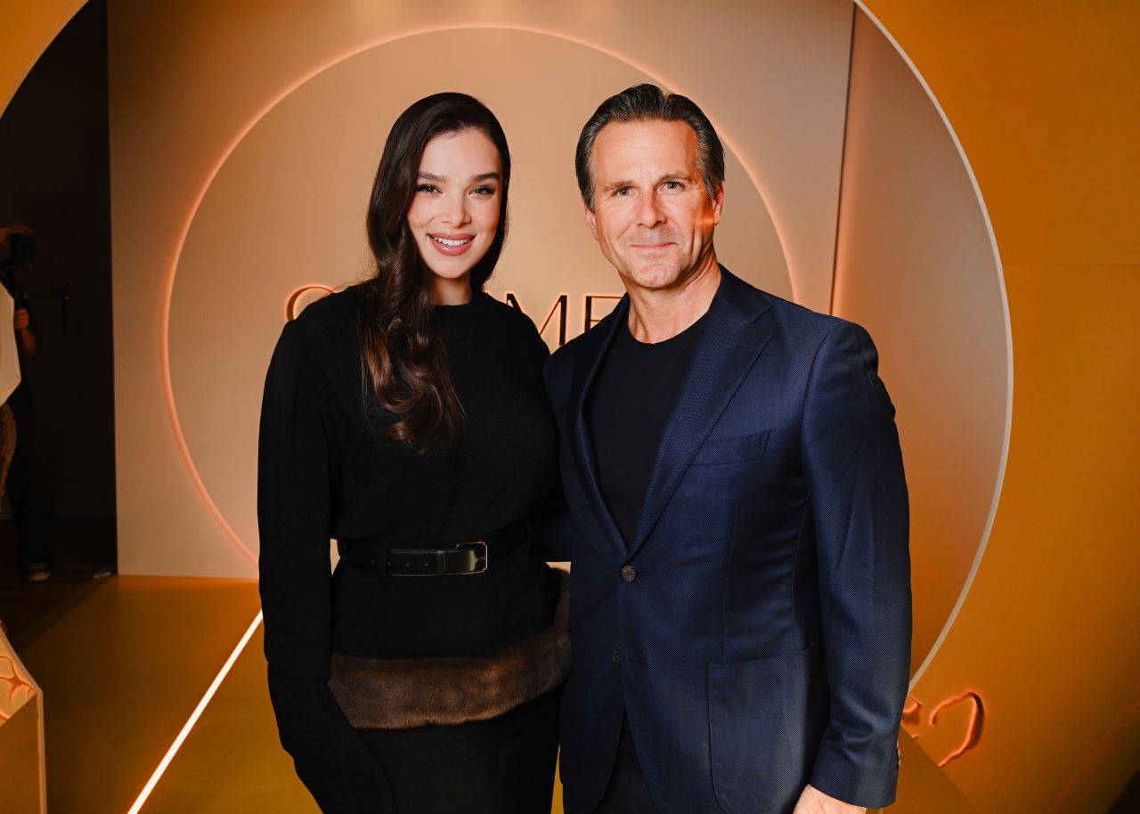 Hailee Steinfeld and Estée Lauder global brand president Justin Boxford at the Glimmer launch event