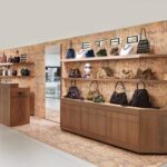 Etro accessories corner at La Rinascente Milano with Paisley walls and handbags