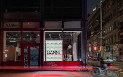 GANNI's illuminated Bou bag window at 40 Mercer Street in Soho at night