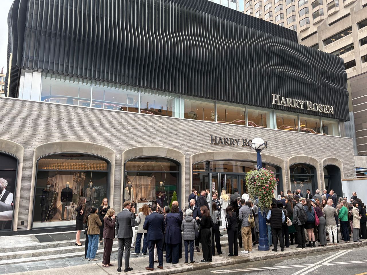 Guests gathered outside the Harry Rosen flagship during its opening