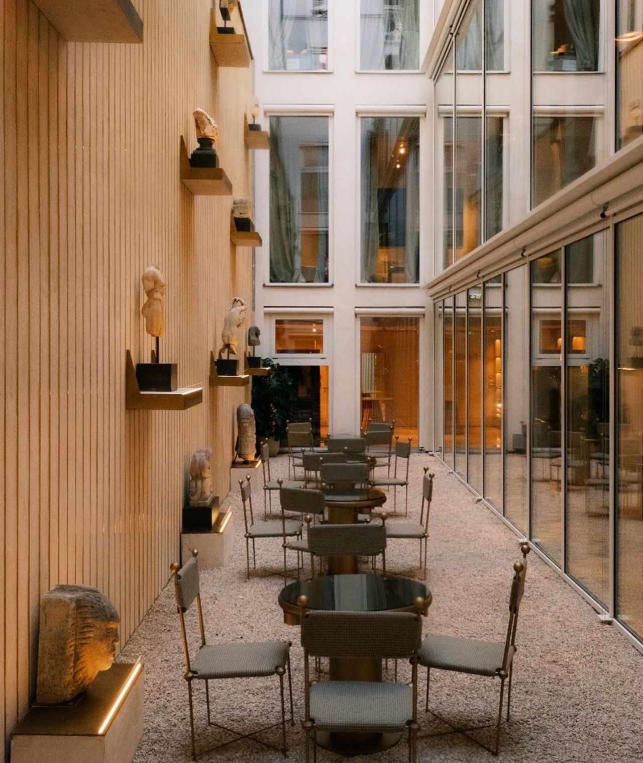 Tables and sculpture displays in the flagship courtyard