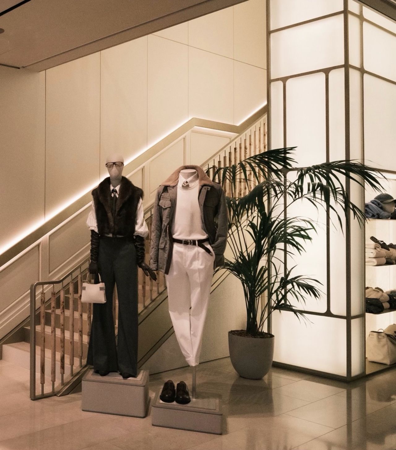 Mannequins beside the flagship staircase