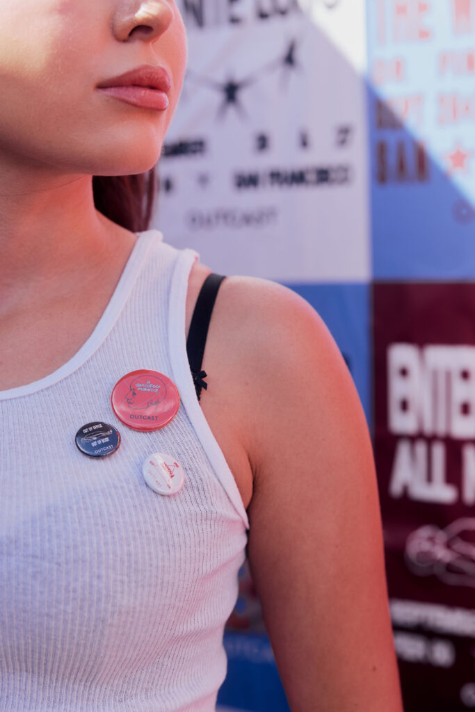 Jayden x meme buttons detail shot at Outcast Clothing’s Portola Festival pop-up