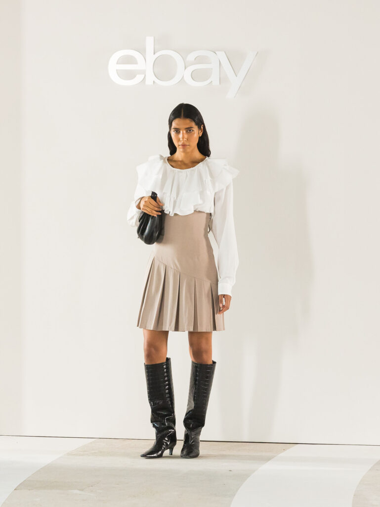 Model wearing a contributed look beneath the eBay logo at Endless Runway 2026