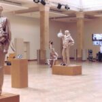 Jimmy Choo Spring 2027 Character Studies presentation with metallic figures and shoes on display