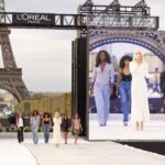Elena Rose and performers on the L’Oréal Paris Le Défilé 2026 stage near the Eiffel Tower