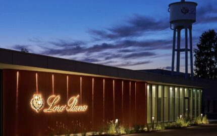 Loro Piana Ghemme factory exterior illuminated at dusk