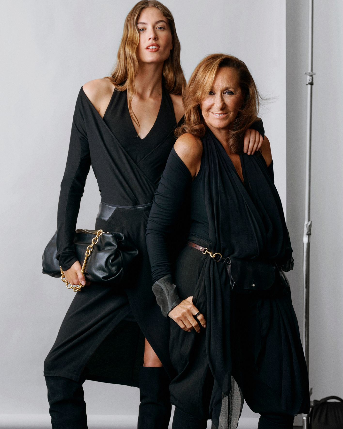 Donna Karan with a model wearing black clothing from the Macy’s collection.