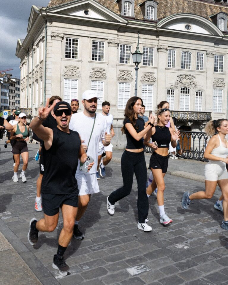 Participants running through Zurich at MCM’s event with The Run Club Zurich