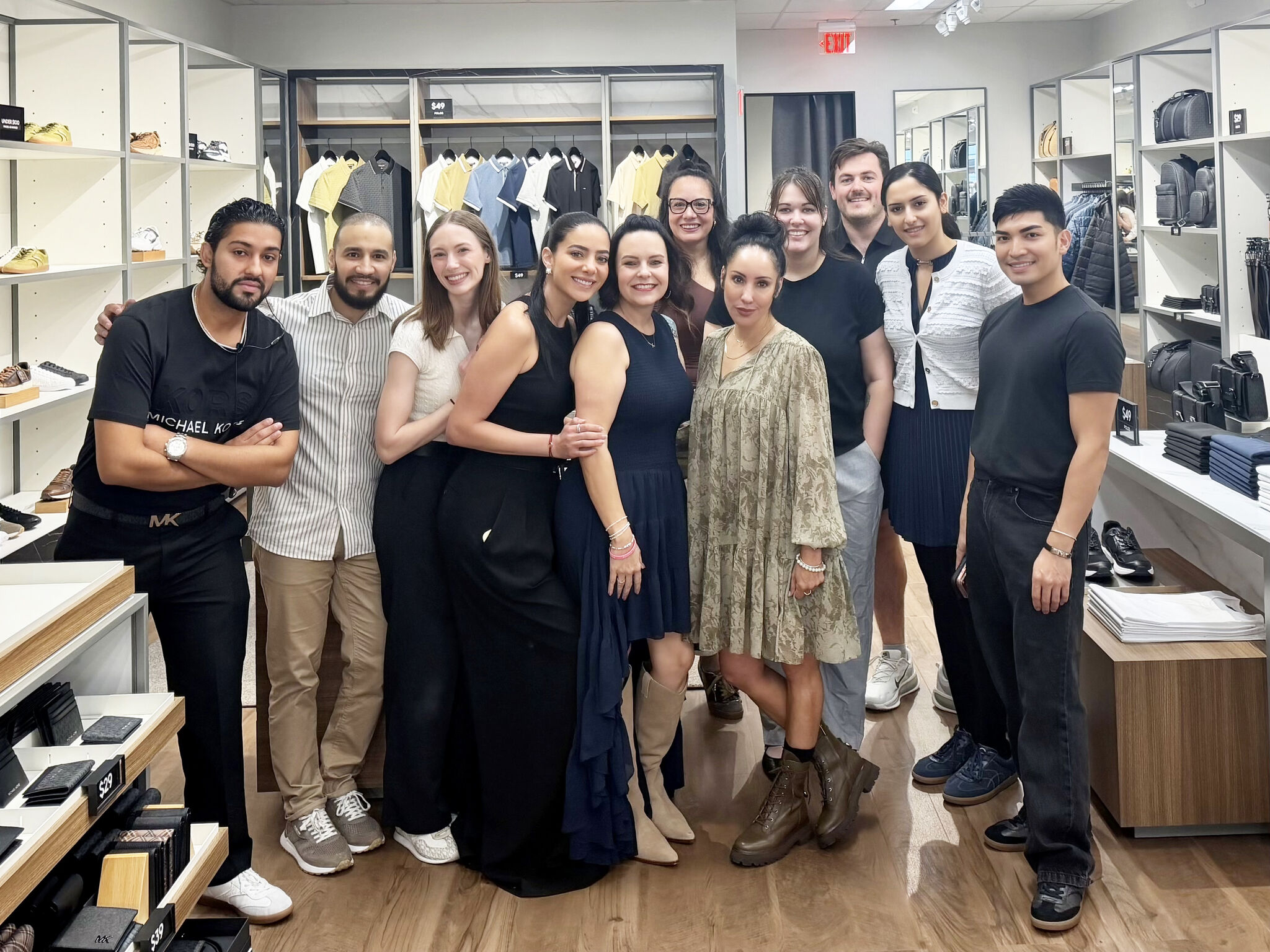 Michael Kors team inside the new men’s store