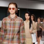 Models on the runway at the Mulberry by Christopher Kane debut show in London