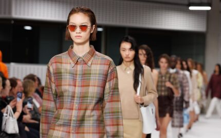 Models on the runway at the Mulberry by Christopher Kane debut show in London