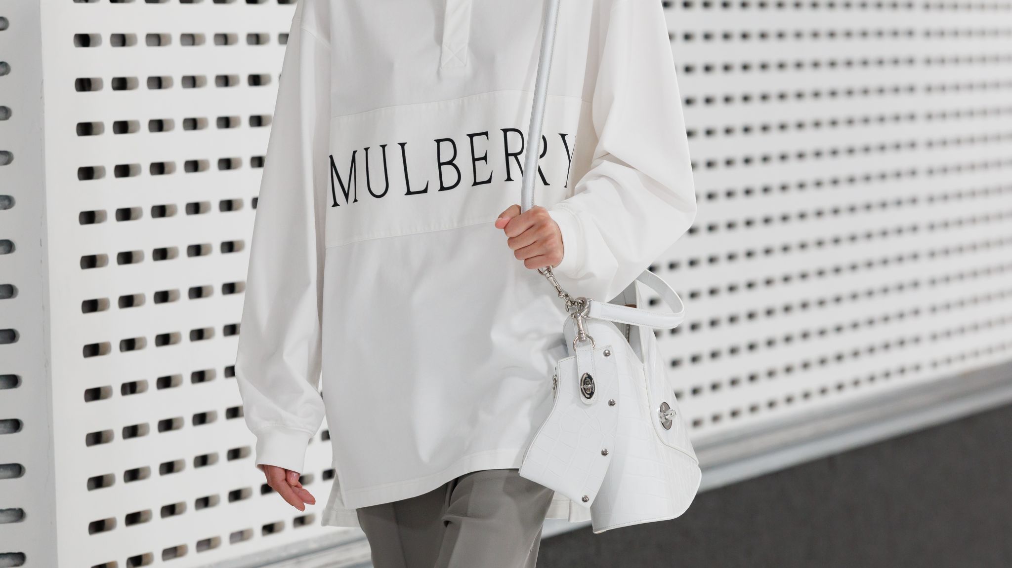 Model wearing the debut Mulberry by Christopher Kane collection