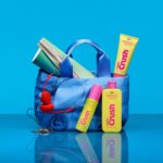 Old Navy Beauty Co. Vanilla Crush products styled with a blue bag and headphones