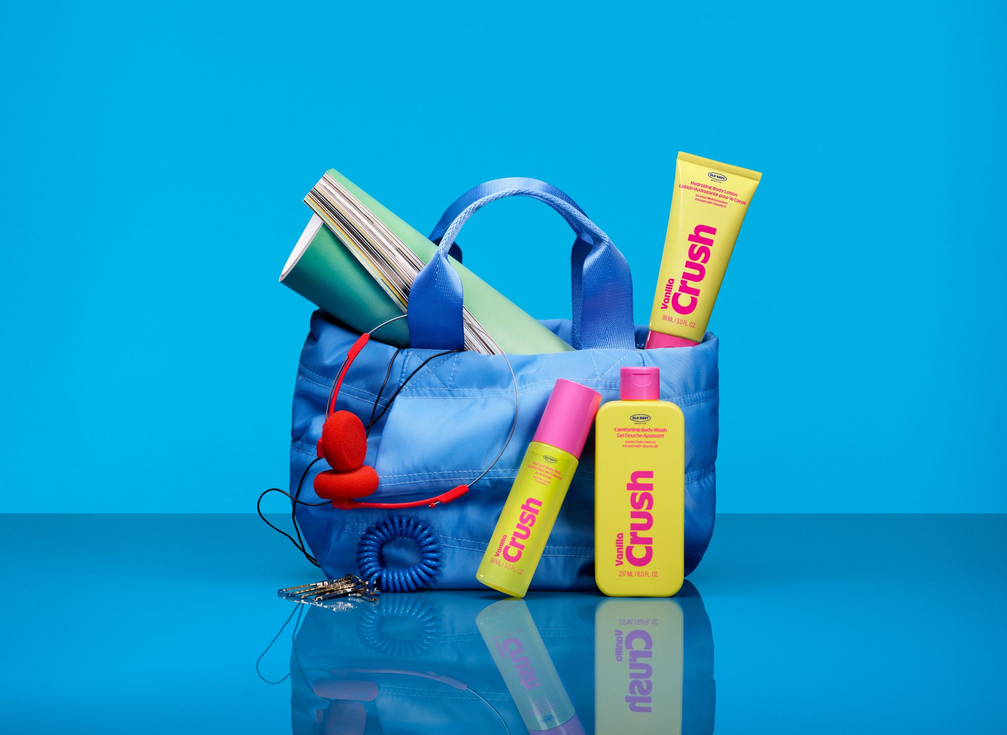 Old Navy Beauty Co. Vanilla Crush products styled with a blue bag and headphones