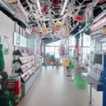 Nautical ropes and beauty displays inside OLIVE YOUNG’s Millac the Market store in Busan