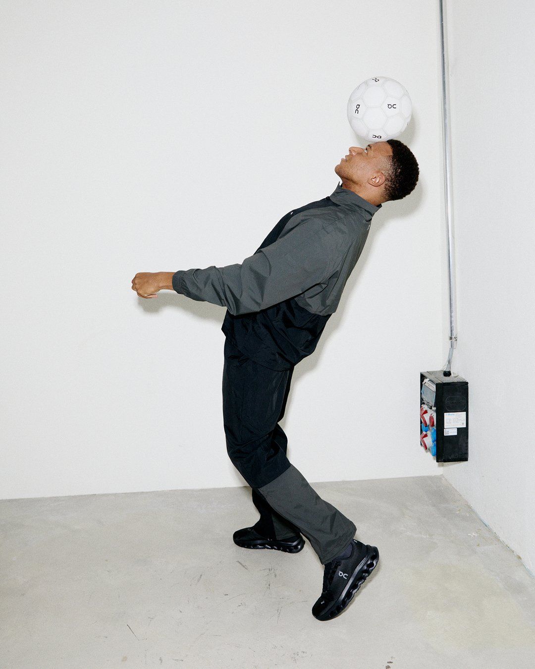 Kylian Mbappé balancing a football in On’s launch campaign